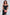ELAGIA black off-the-shoulder maxi dress modeled pose with purple business suit women accessories
