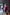 ELAGIA Fuchsia Wrap Long Sleeve Mini Dress detail shot of 3 piece women's suit wrap closure and sleeves
