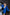 ELAGIA blue backless puff sleeve mini dress - model wearing dress in lifestyle setting, 3 piece women's suit style