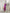 ELAGIA silk dress detail of hemline and length showing purple business suit women's formal design