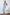 ELAGIA light blue suit women satin 2-piece set with sleeveless top and midi skirt - front view