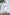 ELAGIA bridal white long sleeve midi dress front view - purple business suit women's formal wear alternative